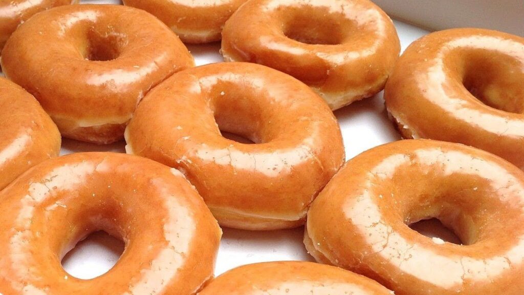 Close-up image of glazed donuts inspired by Krispy Kreme Original Glazed doughnuts